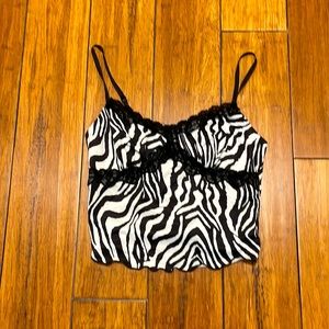 A zebra patterned tank top, size 4 (Small)